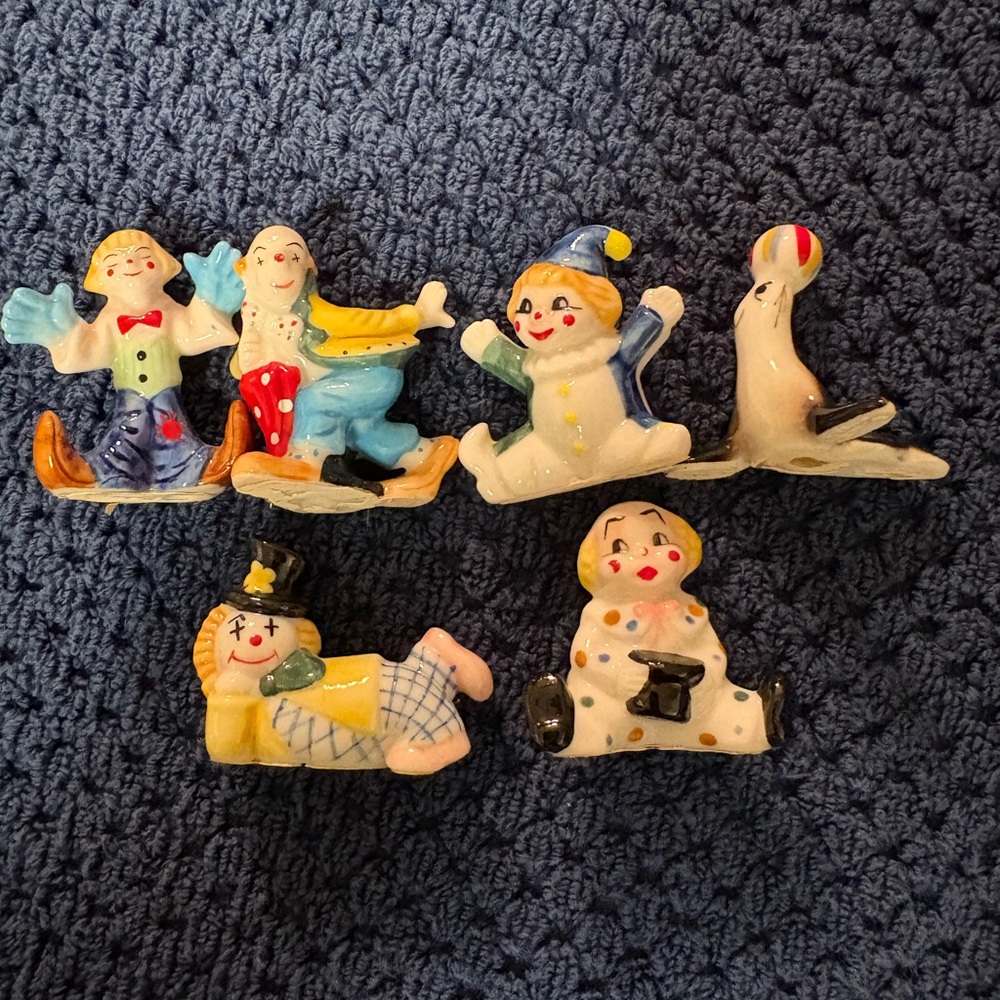 5 Miniature Ceramic/porcelain Clowns and a Miniature Seal Figurines